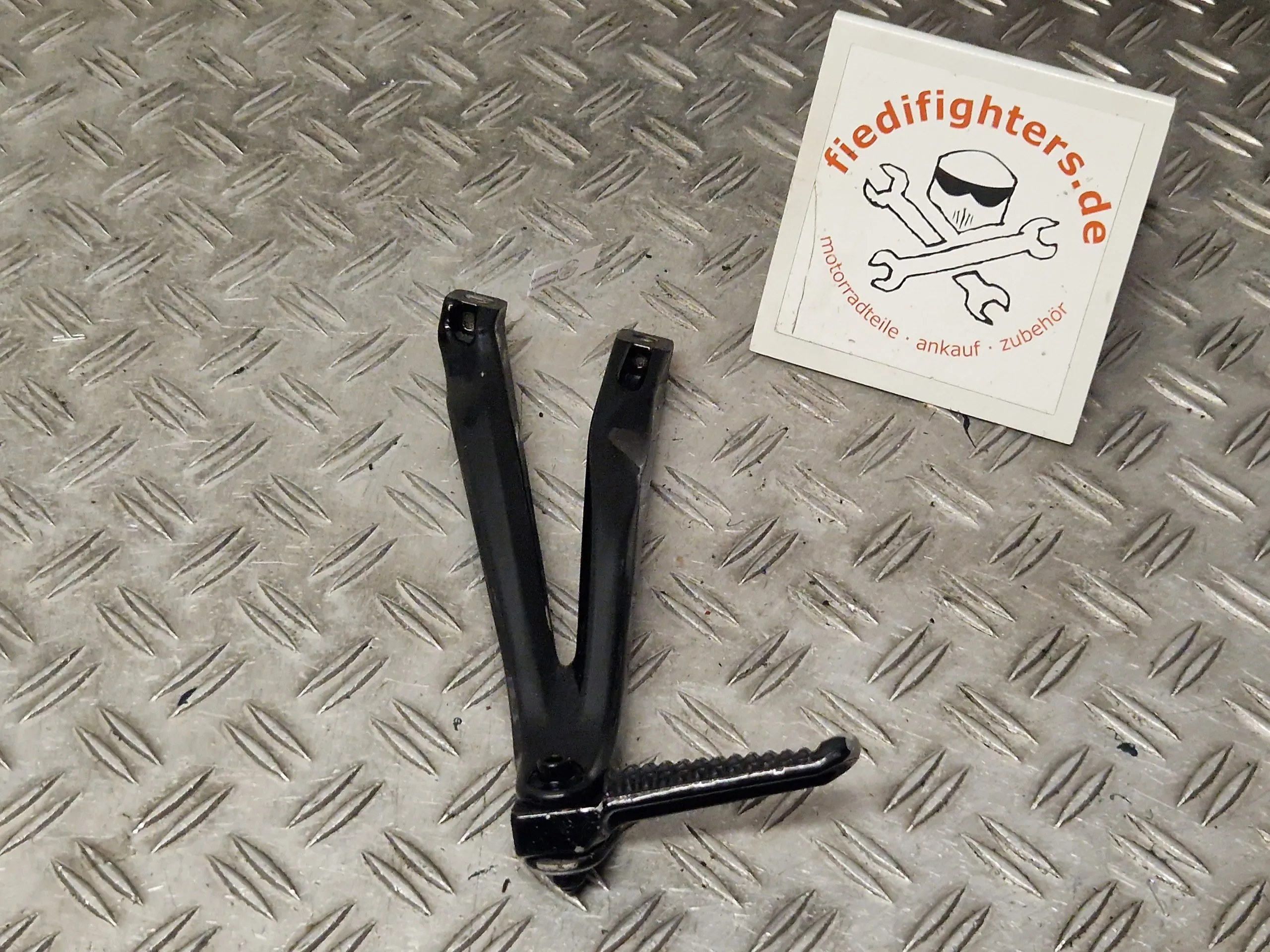 Fußraste hinten links Fußraste Yamaha YZF 1000 R1 RN12 06 126kW 39915km 5VY2741L0100